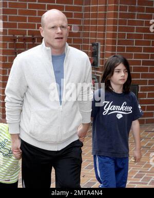 'ER' star Paul McCrane takes a stroll with his children in Beverly Hills, CA. 4/24/09. Stock Photo