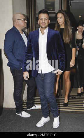 Aussie singer Peter Andre and rumored new girlfriend Emily MacDonagh were seen leaving the Mayfair Hotel in London along with his brother Andrew on their way to see 'Ghost The Musical.' 39 year old Andre stated that he is still getting to know 23 year old MacDonagh who happens to be his surgeons' daughter but thinks she is 'beautiful.' The couple were first spotted out together at the 'Magic Mike' premiere in London last week. London, UK. 17th July 2012. Stock Photo