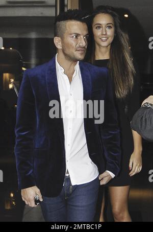 Aussie singer Peter Andre and rumored new girlfriend Emily MacDonagh were seen leaving the Mayfair Hotel in London along with his brother Andrew on their way to see 'Ghost The Musical.' 39 year old Andre stated that he is still getting to know 23 year old MacDonagh who happens to be his surgeons' daughter but thinks she is 'beautiful.' The couple were first spotted out together at the 'Magic Mike' premiere in London last week. London, UK. 17th July 2012. Stock Photo