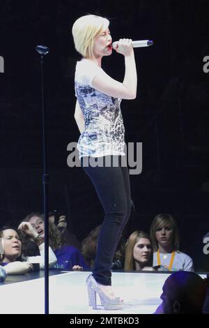 EXCLUSIVE!! Kellie Pickler performs live on stage at the Amway Arena, opening for pop country sensation Taylor Swift during the Fearless Tour. At one point Kellie also performs barefoot. Orlando, FL. 03/05/10.   . Stock Photo