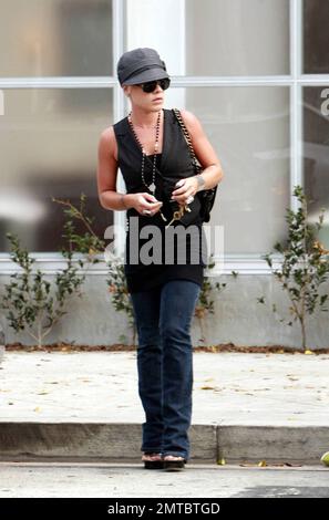 Pop superstar Pink takes a stroll along Melrose Ave. Pink recently performed at the MTV VMA awards on a special outdoor stage and her new single 'So What' is rocketing up the charts. Her new album 'Funhouse' is due in stores on October 28. Los Angeles, CA. 9/12/08. Stock Photo