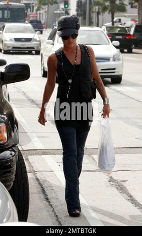 Pop superstar Pink takes a stroll along Melrose Ave. Pink recently performed at the MTV VMA awards on a special outdoor stage and her new single 'So What' is rocketing up the charts. Her new album 'Funhouse' is due in stores on October 28. Los Angeles, CA. 9/12/08. Stock Photo