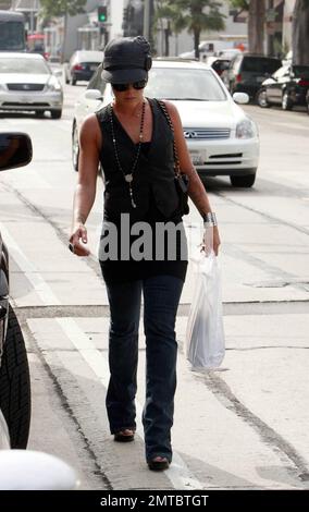 Pop superstar Pink takes a stroll along Melrose Ave. Pink recently performed at the MTV VMA awards on a special outdoor stage and her new single 'So What' is rocketing up the charts. Her new album 'Funhouse' is due in stores on October 28. Los Angeles, CA. 9/12/08. Stock Photo