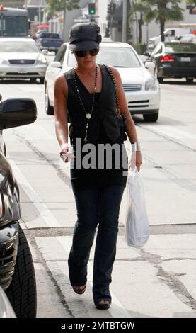 Pop superstar Pink takes a stroll along Melrose Ave. Pink recently performed at the MTV VMA awards on a special outdoor stage and her new single 'So What' is rocketing up the charts. Her new album 'Funhouse' is due in stores on October 28. Los Angeles, CA. 9/12/08. Stock Photo