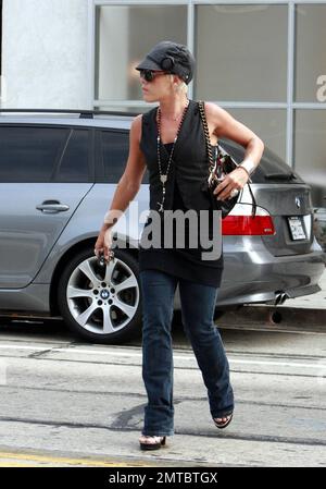 Pop superstar Pink takes a stroll along Melrose Ave. Pink recently performed at the MTV VMA awards on a special outdoor stage and her new single 'So What' is rocketing up the charts. Her new album 'Funhouse' is due in stores on October 28. Los Angeles, CA. 9/12/08. Stock Photo