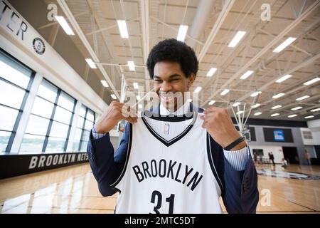 Brooklyn Nets NBA basketball draft pick Jarrett Allen smiles with his jersey after a press conference at the Brooklyn Nets training center in New York Friday June 23 2017. AP Photo Michael Noble Jr St...