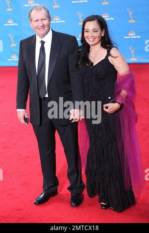Ed O'Neill and wife Catherine Rusoff walk the red carpet for the 62nd Annual Primetime Emmy Awards held at the Nokia Theatre L.A. Live. Los Angeles, CA. 08/29/10. Stock Photo