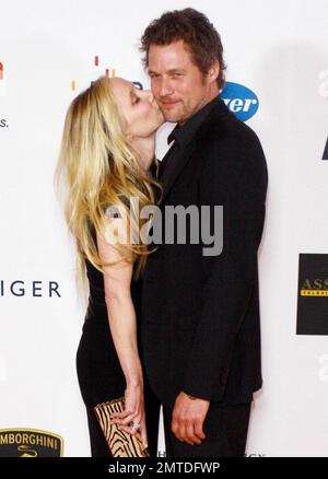 Anne Heche and James Tupper kiss as they arrive at the 17th Annual Race to Erase MS event co-hosted by Nancy Davis of the Nancy Davis Foundation for Multiple Sclerosis and Tommy Hilfiger, who presented a celebrity fashion show during the event which was held at the Hyatt Regency Century Plaza. Los Angeles, CA. 05/07/10. Stock Photo