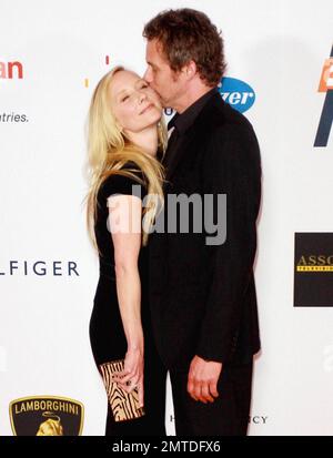 Anne Heche and James Tupper kiss as they arrive at the 17th Annual Race to Erase MS event co-hosted by Nancy Davis of the Nancy Davis Foundation for Multiple Sclerosis and Tommy Hilfiger, who presented a celebrity fashion show during the event which was held at the Hyatt Regency Century Plaza. Los Angeles, CA. 05/07/10. Stock Photo