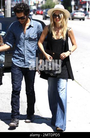 Celebrity stylist Rachel Zoe, husband Rodger Berman and son Skyler spend a family day out, stopping for a bite to eat at an outdoor cafe. West Hollywood, CA. 6/14/11. Stock Photo