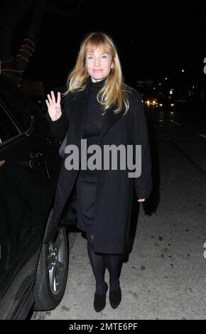 Rebecca De Mornay, dressed all in black, dines at Madeo. De Mornay, best known for her role in the thriller the Hand That Rocks the Cradle, is set to star as another villain in a new movie called Mother's Day. Los Angeles, CA. 12/14/09. Stock Photo