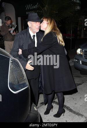 Rebecca De Mornay, dressed all in black, dines at Madeo. De Mornay, best known for her role in the thriller the Hand That Rocks the Cradle, is set to star as another villain in a new movie called Mother's Day. Los Angeles, CA. 12/14/09. Stock Photo