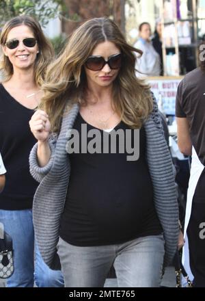 Pregnant actress Rebecca Gayheart looks happy and glowing as she