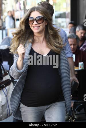 Pregnant actress Rebecca Gayheart looks happy and glowing as she