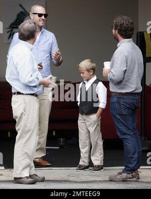 Reese Witherspoon, son Deacon and husband Jim Toth attend church service. Reese smiled for photographers as she left, LA, CA, 06/12/11.