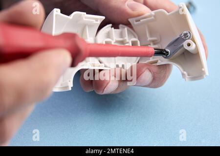 Assembly EU schuko power plug standard type f connector for Europe. Stock Photo