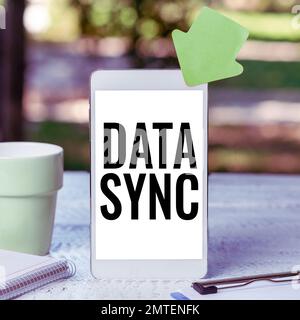 Conceptual caption Data Sync. Internet Concept data that is continuously generated by different sources Stock Photo
