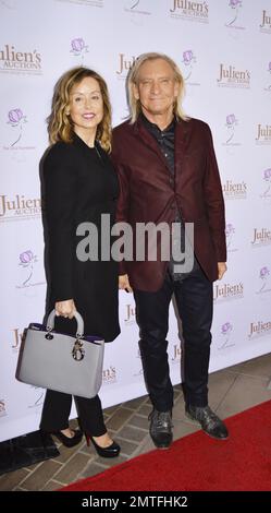 Marjorie Bach and Joe Walsh at the Ringo Starr and Barbara Bach Auction for Julien's Auctions in Beverly Hills, California. The pair are selling items from their homes in London, Beverly Hills and Monaco to help benefit the charity group, The Lotus Foundation. 1st December, 2015. Stock Photo