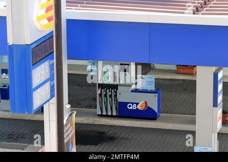 Increase for fuel prices in Italy. Petrol and diesel. Q8 Gas station. Italy. High quality photo Stock Photo