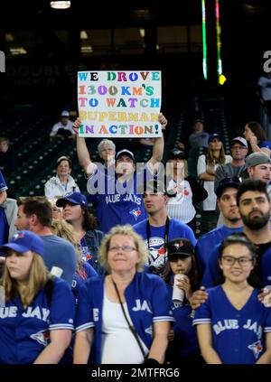 Toronto Blue Jays fans get in the spirit before the first inning of game 1  of the American League Championship Series at Progressive Field in  Cleveland, Ohio on October 14, 2016. Photo