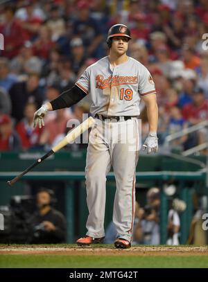 Aug. 14, 2011 - Baltimore, Maryland, U.S - Baltimore Orioles first baseman CHRIS  DAVIS throws his bat in frustration after striking out in a game between  the Detroit Tigers and the Baltimore
