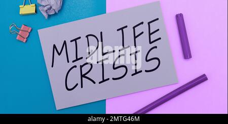 Handwriting text Midlife Crisis. Word Written on Software development technique Decomposing an application Stock Photo