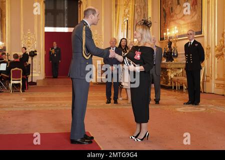 Gaynor Sullivan, (Bonnie Tyler), from Swansea, is made a Member of the Order of the British Empire by the Prince of Wales at Windsor Castle. The honour recognises services to music. Picture date: Wednesday February 1, 2023. Stock Photo