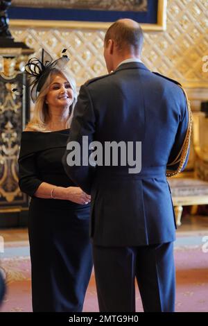 Gaynor Sullivan, (Bonnie Tyler), from Swansea, is made a Member of the Order of the British Empire by the Prince of Wales at Windsor Castle. The honour recognises services to music. Picture date: Wednesday February 1, 2023. Stock Photo