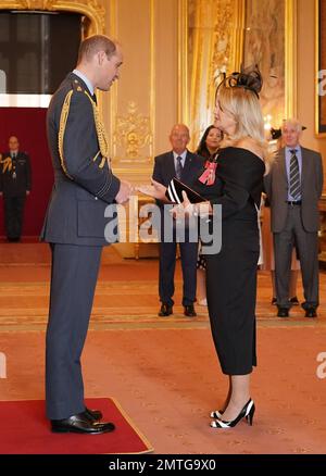 Gaynor Sullivan, (Bonnie Tyler), from Swansea, is made a Member of the Order of the British Empire by the Prince of Wales at Windsor Castle. The honour recognises services to music. Picture date: Wednesday February 1, 2023. Stock Photo