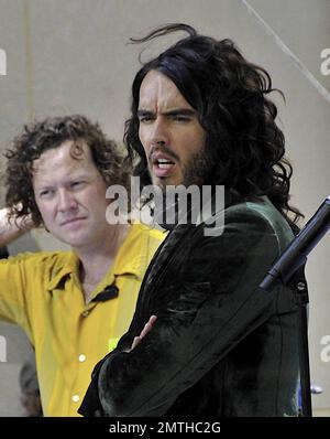 Russell Brand films his new movie 'Get Him to the Greek' on set at NBC's 'Today' Show in Rockefeller Plaza. Brand, who is filming as his character Aldous Snow, took time out to sign autographs for onlookers during a break from filming. New York, NY. 7/26/09. Stock Photo