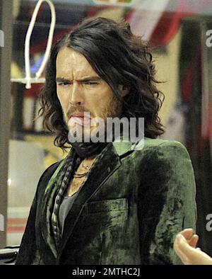 Russell Brand films his new movie 'Get Him to the Greek' on set at NBC's 'Today' Show in Rockefeller Plaza. Brand, who is filming as his character Aldous Snow, took time out to sign autographs for onlookers during a break from filming. New York, NY. 7/26/09. Stock Photo