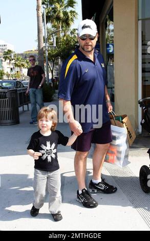 Russell Crowe shops in Beverly Hills this afternoon with wife Danielle Spencer and kids Charlie and Tennyson. They shopped at Roots, where they stocked up on shoes for the family. Los Angeles, CA. 4/15/08. Stock Photo