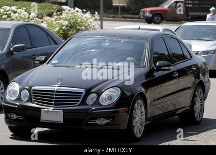 Sylvester Stallone arrives at his son Sage Stallone's funeral. Wearing
