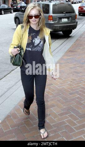 Actress Sarah Paxton smiles for the cameras as she's out and about