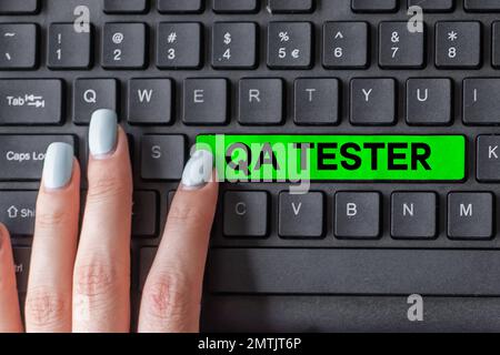 Handwriting text Qa Tester. Concept meaning Quality assurance of an on going project before implementation Stock Photo