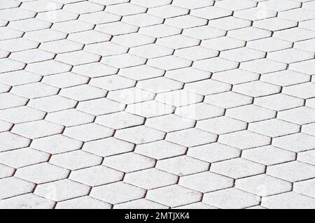The roof of hexagons is covered with fresh snow. Selective focus Stock Photo