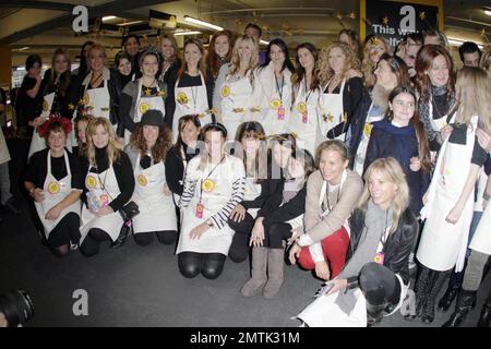 Celebrity stall holders help out at the Selfridges Really Really Great Garage Sale. The event included donations from a range of celebrities including Rachel Weiss,Kate Moss, Jemima Khan and Gwyneth Paltrow with all proceeds go to Mothers4children charity. London, UK. 11/14/10. Stock Photo