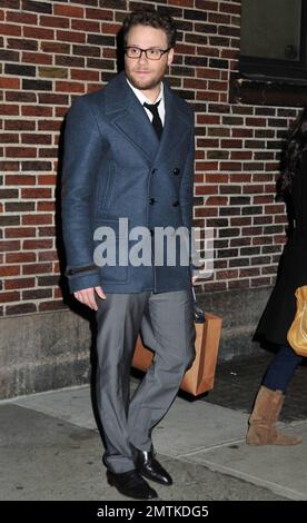 Seth Rogen looks slim and trim as he poses for photos outside the 
