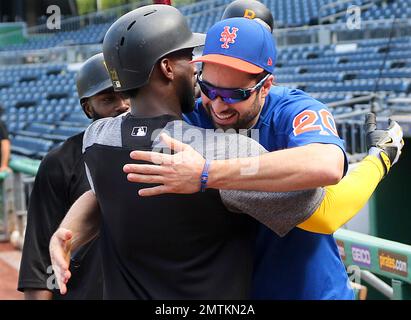 Former Pittsburgh Pirates center fielder Andy Van Slyke takes the mound for  a ceremonial pitch before a baseball game between the Pittsburgh Pirates  and the St. Louis Cardinals, Saturday, Aug. 4, 2018