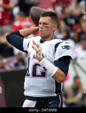 **FILE PHOTO** Tom Brady Announces Retirement. New England Patriots quarterback Tom Brady (12) warms-up prior to the game against the Washington Redskins at FedEx Field in Landover, Maryland on Sunday, October 6, 2019. Credit: Ron Sachs/CNP/MediaPunch Stock Photo
