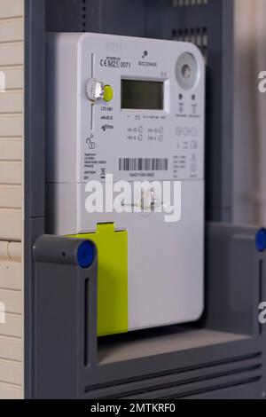 Brecht, Belgium - 26 januari 2023: Portrait of a new installed Belgian digital electricity kilowatt hour meter. The device is used by the provider to Stock Photo