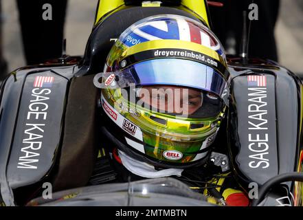 https://l450v.alamy.com/450v/2mtmbtn/file-in-this-friday-may-19-2017-file-photo-sage-karam-sits-in-the-cockpit-of-his-car-during-a-practice-session-for-the-indianapolis-500-indycar-auto-race-at-indianapolis-motor-speedway-in-indianapolis-karam-would-love-to-have-his-face-sculpted-on-the-borg-warner-trophy-presented-in-honor-of-each-years-indianapolis-500-champion-until-then-karam-figures-a-tattoo-of-the-famed-indianapolis-motor-speedway-wing-and-wheel-logo-on-his-wrist-will-have-to-do-ap-photomichael-conroy-file-2mtmbtn.jpg