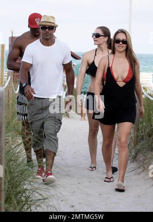 'Criminal Minds' star Shemar Moore shows off his ripped abs while wearing white swim shorts as he cools off with an ocean swim. Shemar celebrated his 42nd birthday just two weeks ago. Miami, FL. 3rd May 2012. Stock Photo
