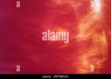abstract red background with sparkles liquid waves and motion Stock Photo