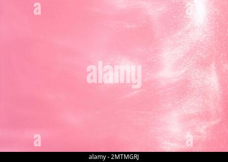 delicate pink background with sequins waves liquid motion Stock Photo