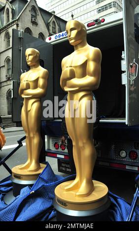Eight-foot tall Oscar statues wait outside The New York Palace Hotel after being delivered for the 82nd Annual Academy Awards New York viewing party. New York, NY. 03/04/10. Stock Photo