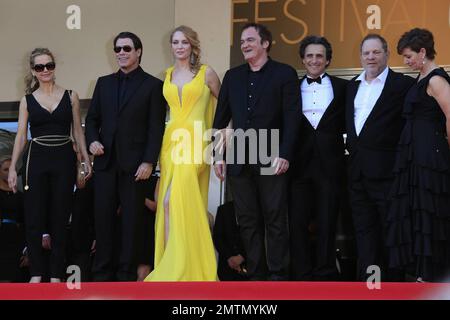 Kelly Preston, John Travolta, Uma Thurman, Quentin Tarantino, Lawrence Bender and Harvey Weinstein at the “Sils Maria” Premiere held at the Palais des Festivals during the 67th Annual Cannes Film Festival in Cannes, France. May 23rd, 2014. Stock Photo