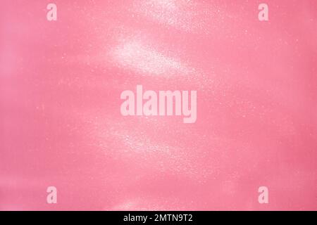 delicate pink background with sequins waves liquid motion Stock Photo