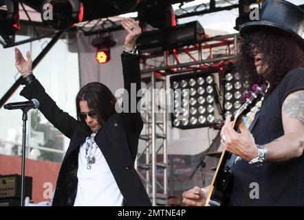 American singer Myles Kennedy performs live on stage with legendary guitarist Slash (aka Saul Hudson) during the 2010 Sunset Strip Music Festival. Los Angeles, CA. 08/28/10. Stock Photo