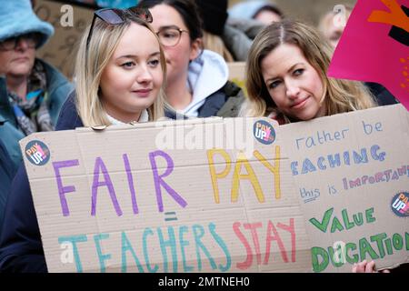 Gloucester, Gloucestershire, UK – Wednesday 1st February 2023 – Teachers and members of the National Education Union ( NEU ) take strike action across England and Wales take part in a protest in Gloucester city centre with some schools closed and others only partially open. Photo Steven May / Alamy Live News Stock Photo